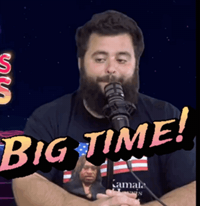 A Man With A Beard Is Singing Into A Microphone With The Words Big Time Written On The Bottom GIF