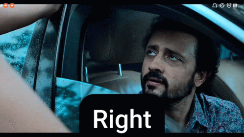 A Man With A Beard Is Sitting In A Car Next To The Word Right GIF