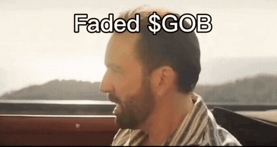 A Man With A Beard Is Sitting In A Car With The Words Faded $ Gob Written Above Him GIF