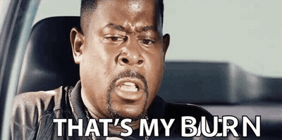 A Man With A Beard Is Sitting In A Car With The Words `` That 'S My Burn '' Written On The Screen . GIF