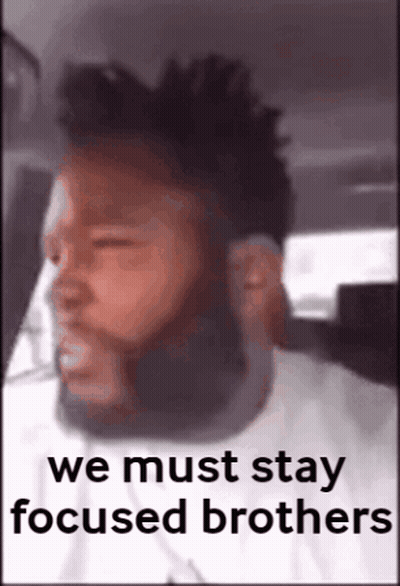 A Man With A Beard Is Sitting In A Car With The Words We Must Stay Focused Brothers Above Him GIF
