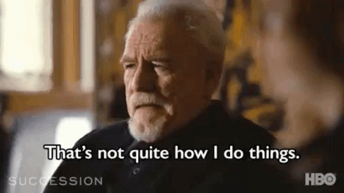 A Man With A Beard Is Sitting In A Chair And Saying `` That 'S Not Quite How I Do Things '' . GIF
