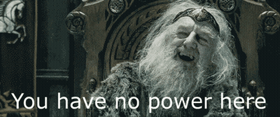 A Man With A Beard Is Sitting In A Chair With The Words " You Have No Power Here " Written Below Him GIF