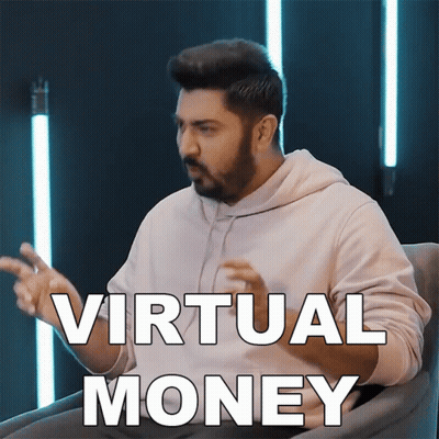 A Man With A Beard Is Sitting In A Chair With Virtual Money Written On The Screen GIF
