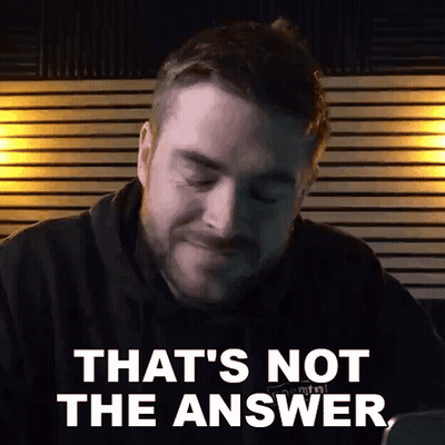A Man With A Beard Is Sitting In Front Of A Laptop Computer And Says `` That 'S Not The Answer '' . GIF