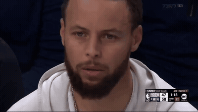 A Man With A Beard Is Sitting In Front Of A Screen That Says Tsn On It GIF