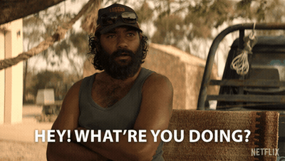 A Man With A Beard Is Sitting In Front Of A Truck And Says " Hey What 'Re You Doing " GIF