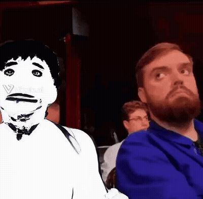 A Man With A Beard Is Sitting Next To Another Man With A White Face GIF