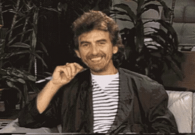 A Man With A Beard Is Sitting On A Couch And Says It 'S George Harrison ... Remember Me ? GIF