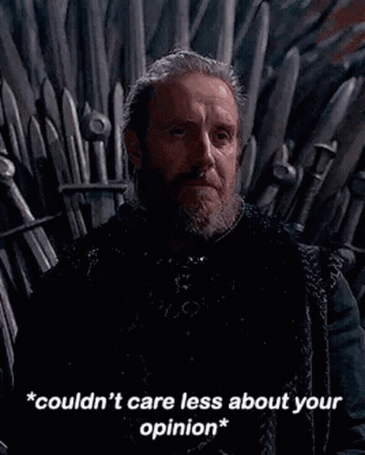 A Man With A Beard Is Sitting On A Throne With A Sword In His Hand . GIF