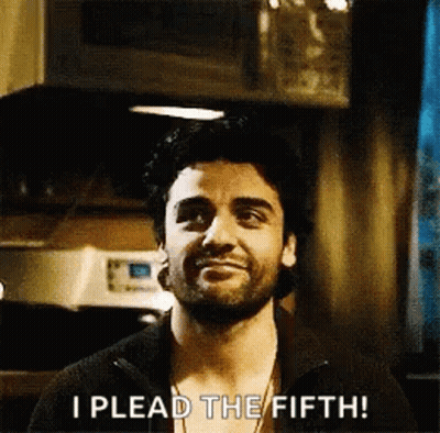 A Man With A Beard Is Smiling And Saying I Plead The Fifth . GIF