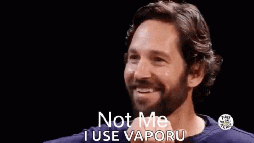 A Man With A Beard Is Smiling And Saying Not Me I Use Vaporu GIF