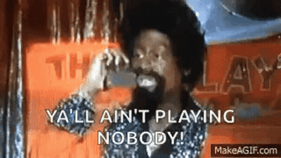 A Man With A Beard Is Smiling And Saying `` Ya 'Ll Ain 'T Playing Nobody '' . GIF