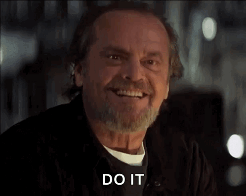 A Man With A Beard Is Smiling And Says Do It GIF