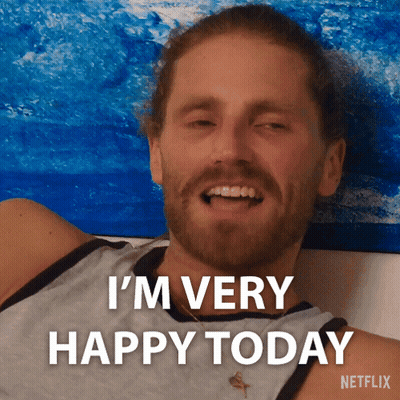 A Man With A Beard Is Smiling And Says I 'M Very Happy Today Netflix GIF