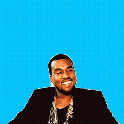 A Man With A Beard Is Smiling And Wearing A Black Jacket GIF