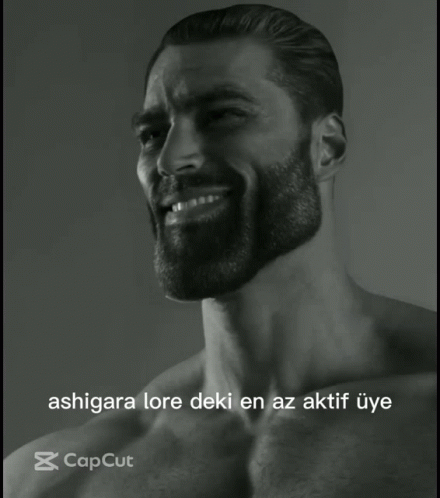 A Man With A Beard Is Smiling In A Black And White Photo With The Caption Ashigara Lore Deki En Az Aktif Uye GIF