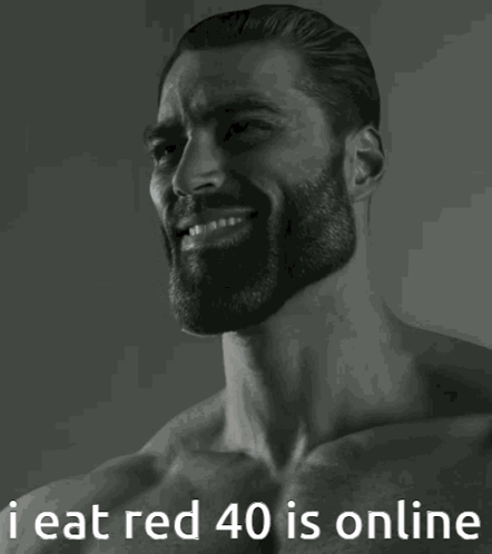 A Man With A Beard Is Smiling With The Words I Eat Red 40 Is Online GIF