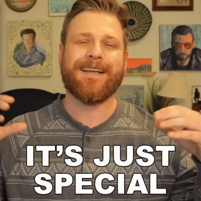 A Man With A Beard Is Smiling With The Words It 'S Just Special Behind Him GIF