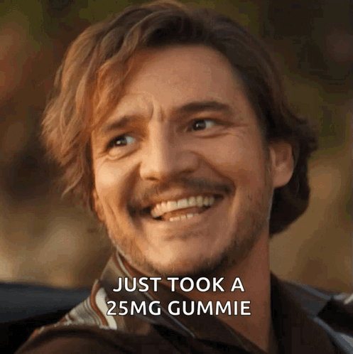 A Man With A Beard Is Smiling With The Words Just Took A 25Mg Gummie Next To Him GIF