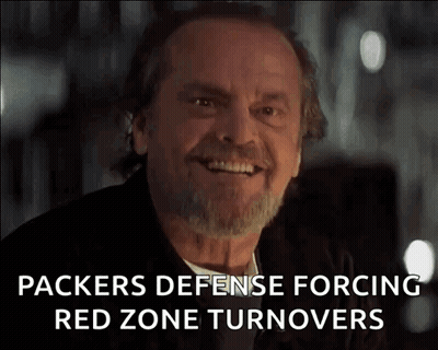 A Man With A Beard Is Smiling With The Words Packers Defense Forcing Red Zone Turnovers Below Him GIF