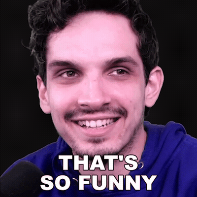 A Man With A Beard Is Smiling With The Words That 'S So Funny On His Face GIF