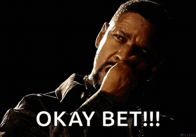 A Man With A Beard Is Smoking A Cigarette And Saying `` Okay Bet ! '' GIF