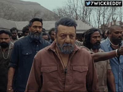 A Man With A Beard Is Standing In A Crowd With A 7Wickreddy Logo On The Bottom GIF