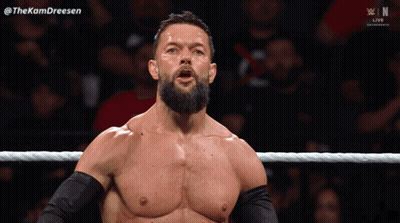 A Man With A Beard Is Standing In A Wrestling Ring With The Hashtag Thekamdreesen GIF