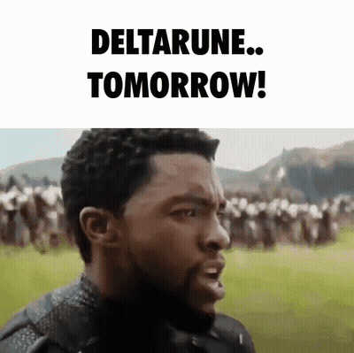 A Man With A Beard Is Standing In Front Of A Crowd Of People And Saying `` Deltarune Tomorrow '' . GIF