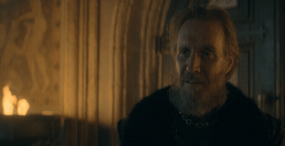 A Man With A Beard Is Standing In Front Of A Fire With The Words You Above Him GIF