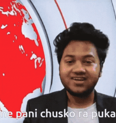 A Man With A Beard Is Standing In Front Of A Globe And Says `` Ne Pani Chusko Ra Puke '' . GIF