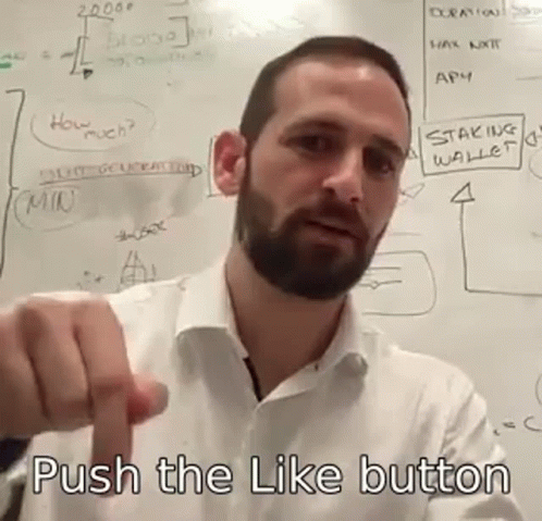 A Man With A Beard Is Standing In Front Of A Whiteboard With The Words Push The Like Button Written On It GIF