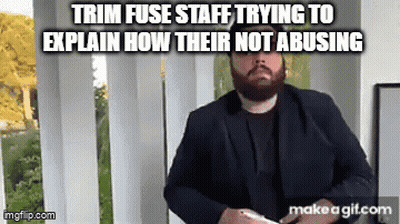A Man With A Beard Is Standing In Front Of A Window With A Caption That Says Trim Fuse Staff Trying To GIF