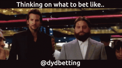 A Man With A Beard Is Standing Next To Another Man In A Suit With The Caption Thinking On What To Bet Like @Dydbetting GIF