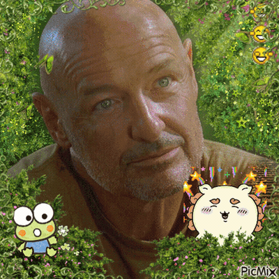 A Man With A Beard Is Surrounded By A Frog And Flowers And Says Picmix On The Bottom Right GIF