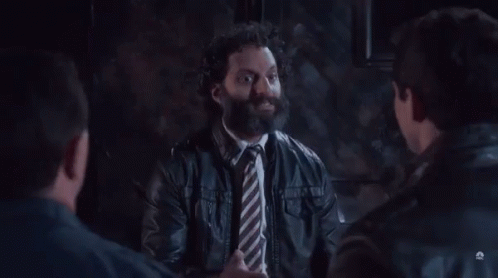 A Man With A Beard Is Surrounded By Other Men With The Words It 'S The Circle Of Written Above Him GIF