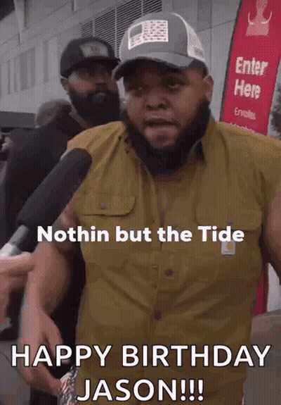 A Man With A Beard Is Talking Into A Microphone And Says Nothin But The Tide Happy Birthday Jason GIF