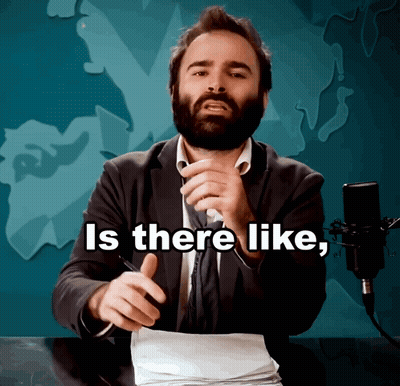 A Man With A Beard Is Talking Into A Microphone And The Words Is There Like Are Above Him GIF