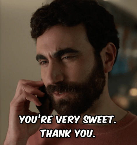 A Man With A Beard Is Talking On A Phone And Says You 'Re Very Sweet Thank You GIF