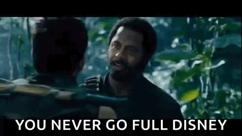 A Man With A Beard Is Talking To Another Man In The Jungle And The Caption Says `` You Never Go Full Disney '' . GIF