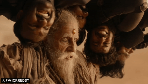 A Man With A Beard Is Upside Down With X7wickreddy Written On The Bottom Right GIF