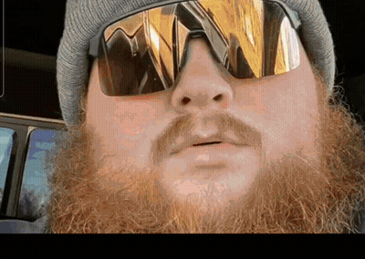 A Man With A Beard Is Wearing A Beanie And Sunglasses GIF