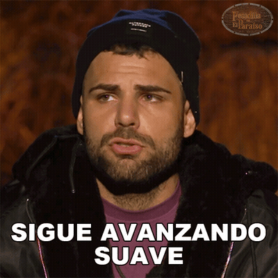 A Man With A Beard Is Wearing A Black Beanie And A Purple Shirt With The Words Sigue Avanzando Suave Below Him GIF