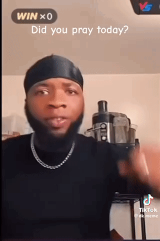 A Man With A Beard Is Wearing A Black Headband And A Chain Around His Neck While Asking If He Prayed Today . GIF