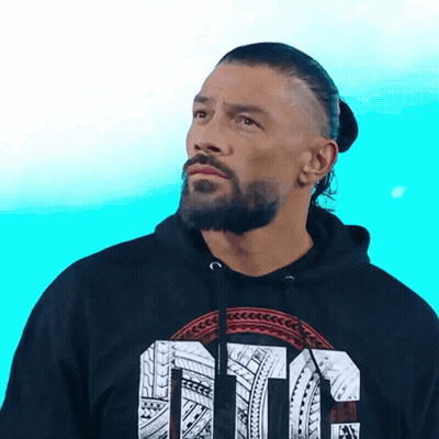 A Man With A Beard Is Wearing A Black Hoodie With The Word Ote On It GIF