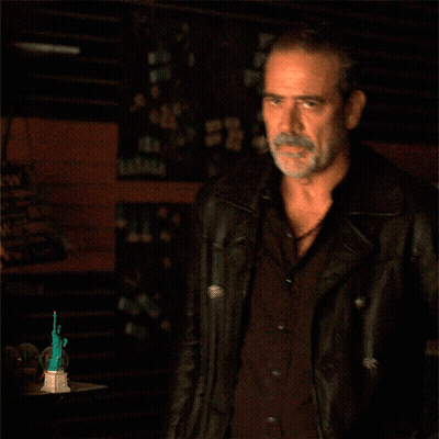A Man With A Beard Is Wearing A Black Jacket GIF