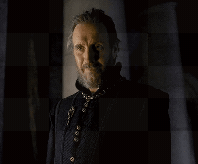 A Man With A Beard Is Wearing A Black Jacket GIF