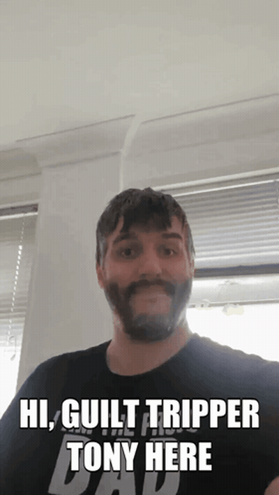A Man With A Beard Is Wearing A Black Shirt That Says Guilt Tripper Tony Here GIF