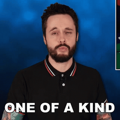 A Man With A Beard Is Wearing A Black Shirt With The Words One Of A Kind On It GIF